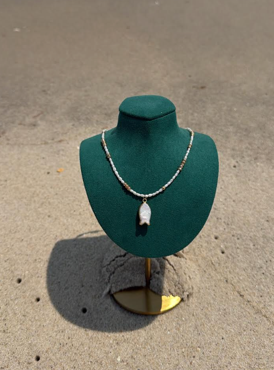 The Soleil Pearl Necklace with pearl fish charm